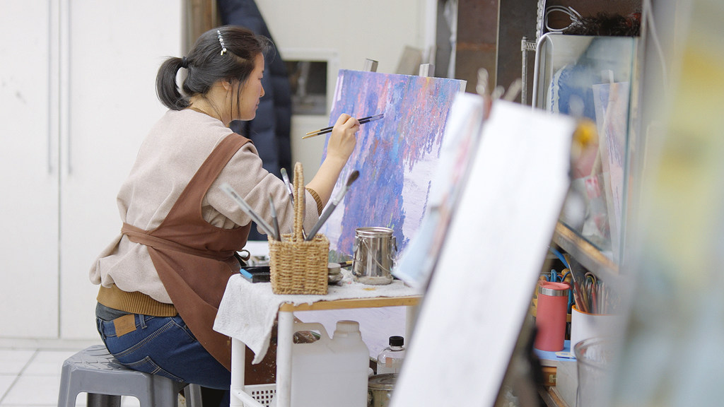 An artist at work in Seoul, Republic of Korea.